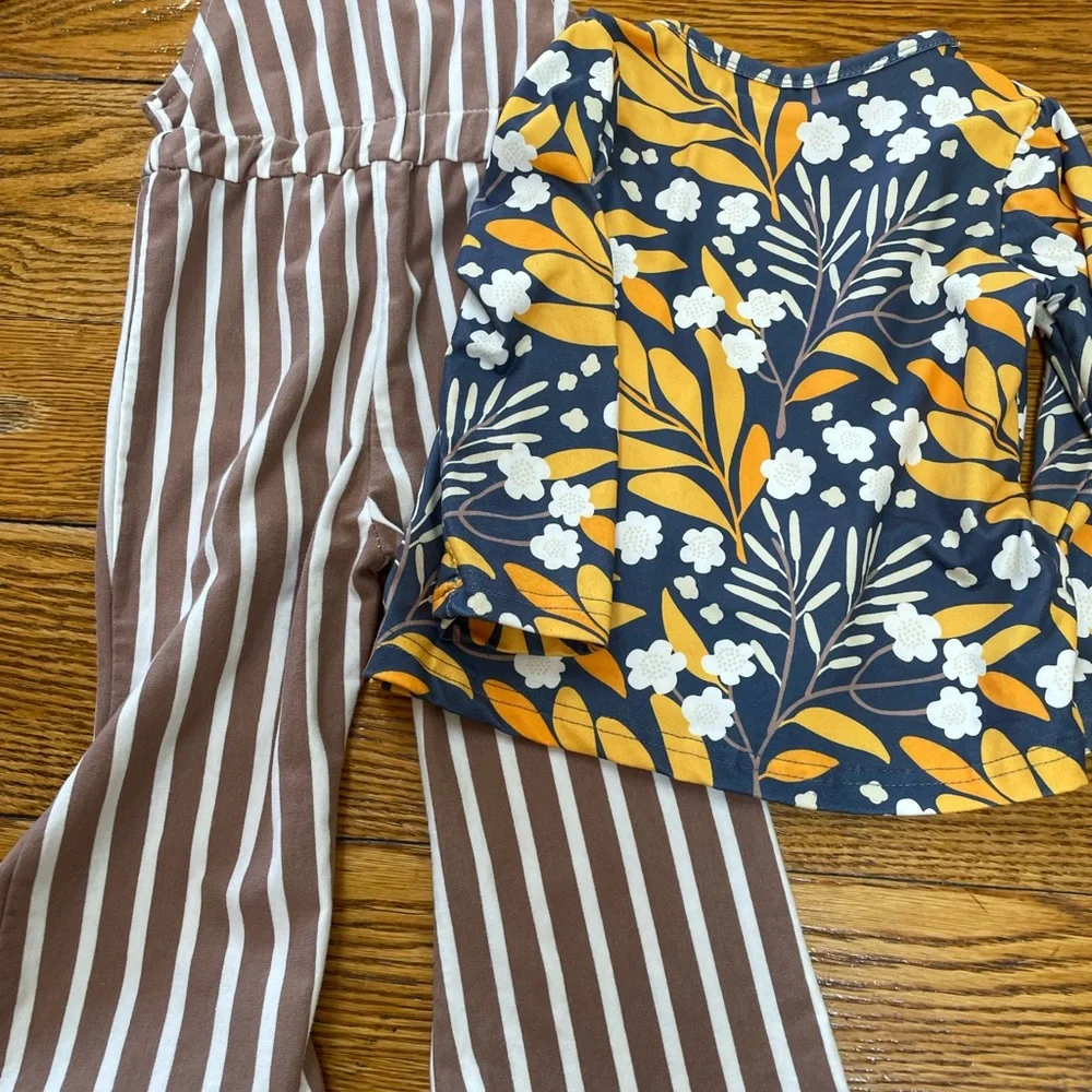 Girls striped toddler’s overalls with floral top.  Size XS (2T). No brand.